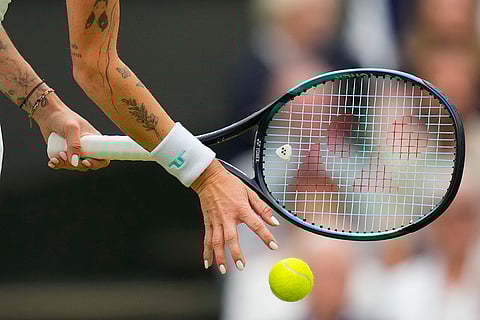 Marketa Vondrousova prepares to serve to Jessica Bouzas Maneiro